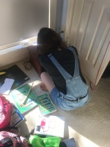 Sawyer working in her room