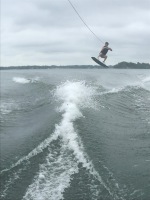 Sims playing on the wakeboard
